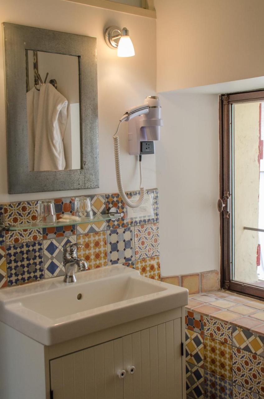 فيناسك Hotel Les Remparts المظهر الخارجي الصورة